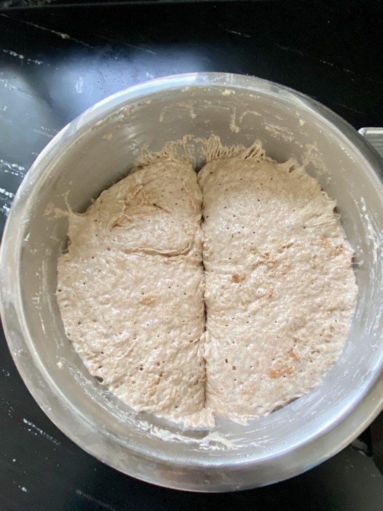 Since I am baking all of the dough today, I divided the dough in half in the bowl first. 