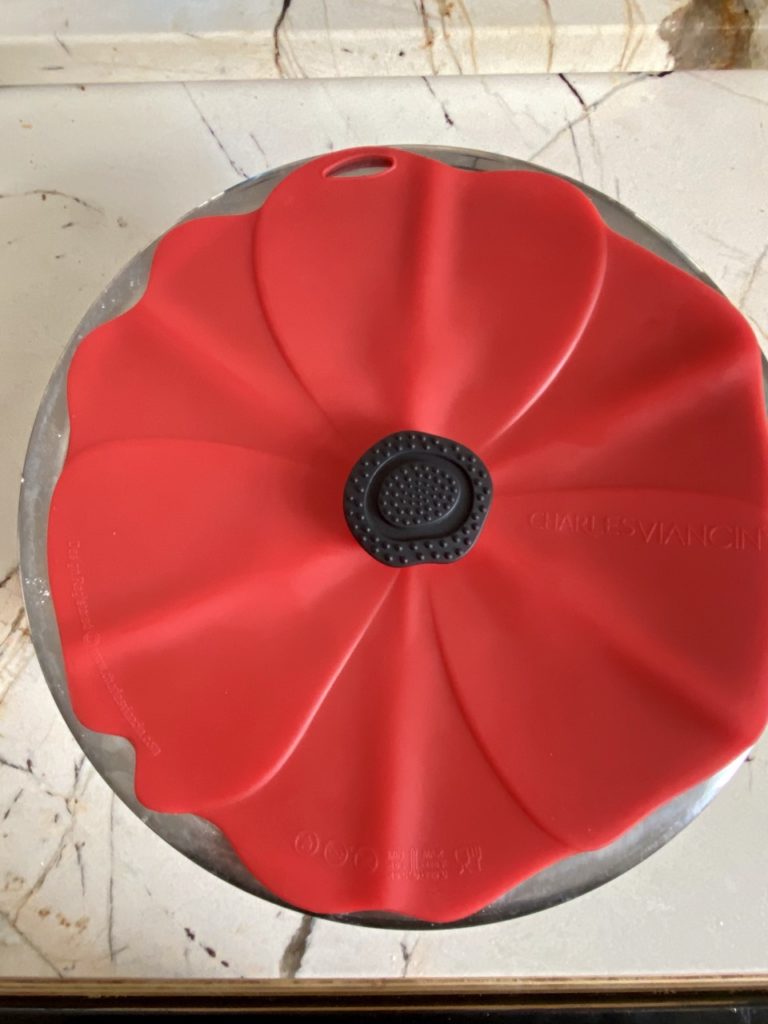The Charles Viancin 9 inch Poppy lid fits well over my metal mixing bowl.