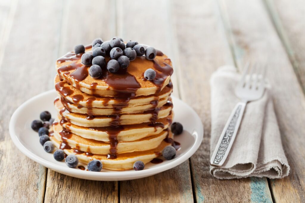Fluffy blueberry pancakes with blueberry compote
