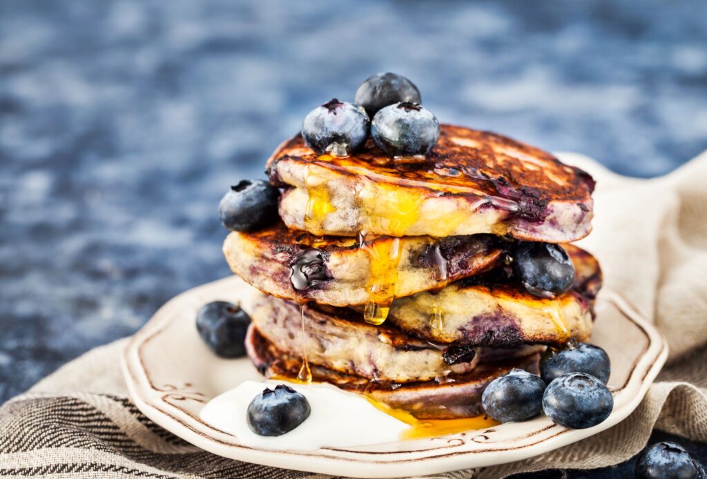 Delicious blueberry pancakes with blueberry compote.