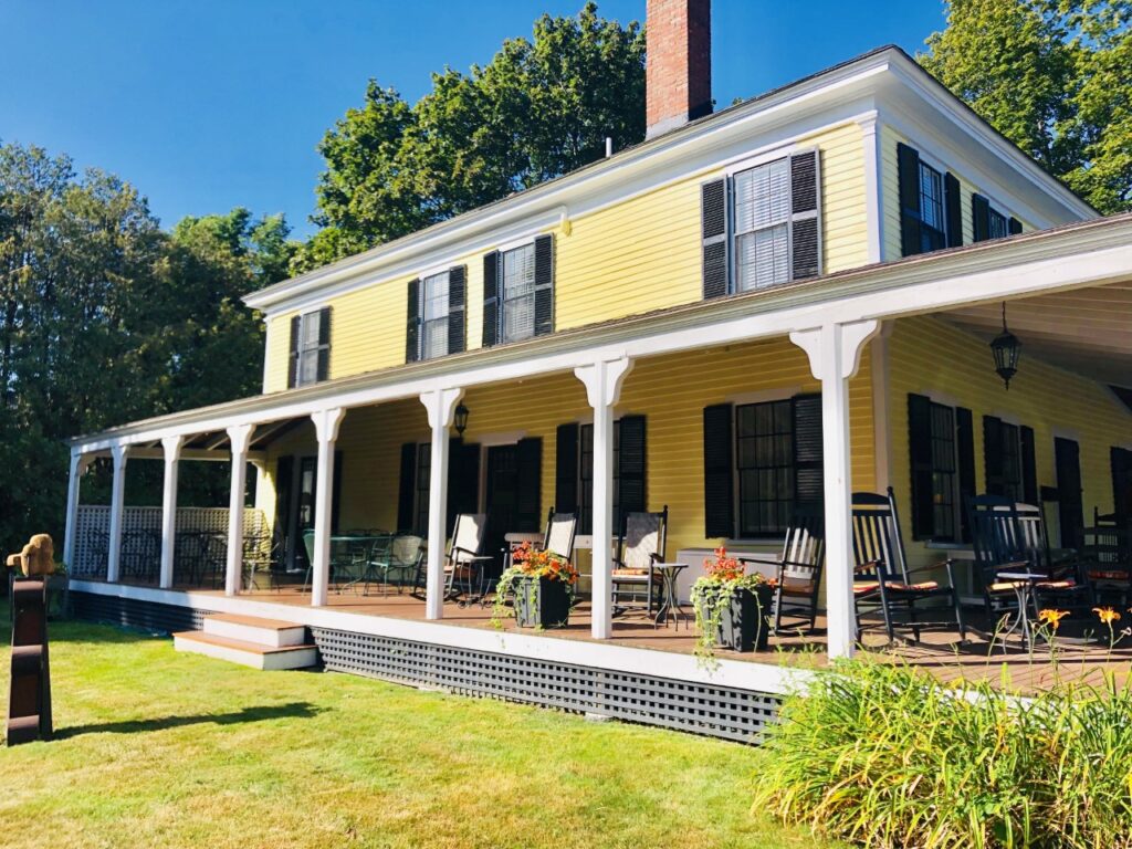Just look at that gorgeous wrap-around porch at the Yellow House B & B!