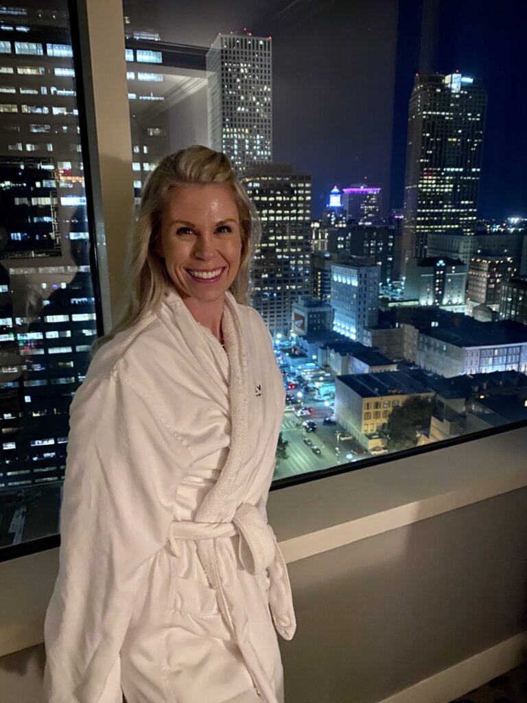 I'm getting cozy in my Loews New Orleans Hotel robe. New Orleans Family Vacation. 
