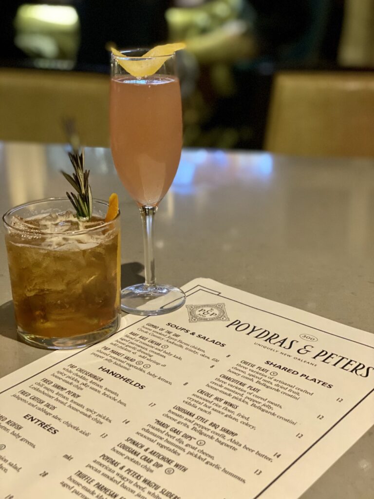 Cocktail menu and drinks at Poydras & Peters inside the Loews New Orleans Hotel. New Orleans Family Vacation. 