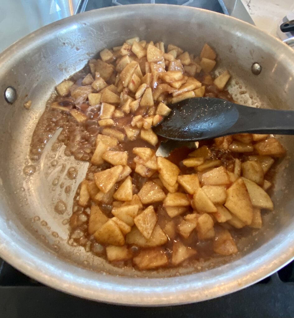 The filling for our Spiced Apple Hand Pies is being made in the sauté pan. 