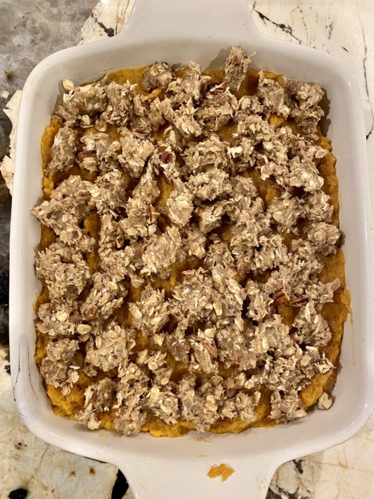 Fully top that roasted sweet potato mixture with generous chunks of streusel for the best Maple Pecan Sweet Potato Streusel.