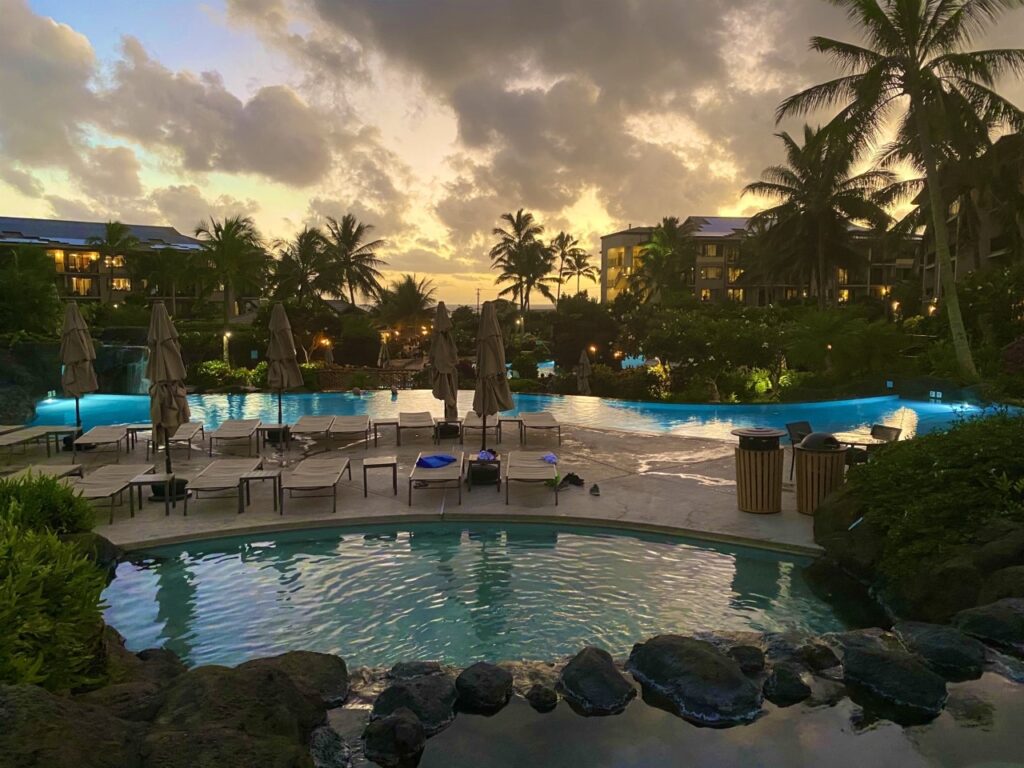 Sunset hour at the top of the Koloa Landing Resort Main Pool - Best of Kauai