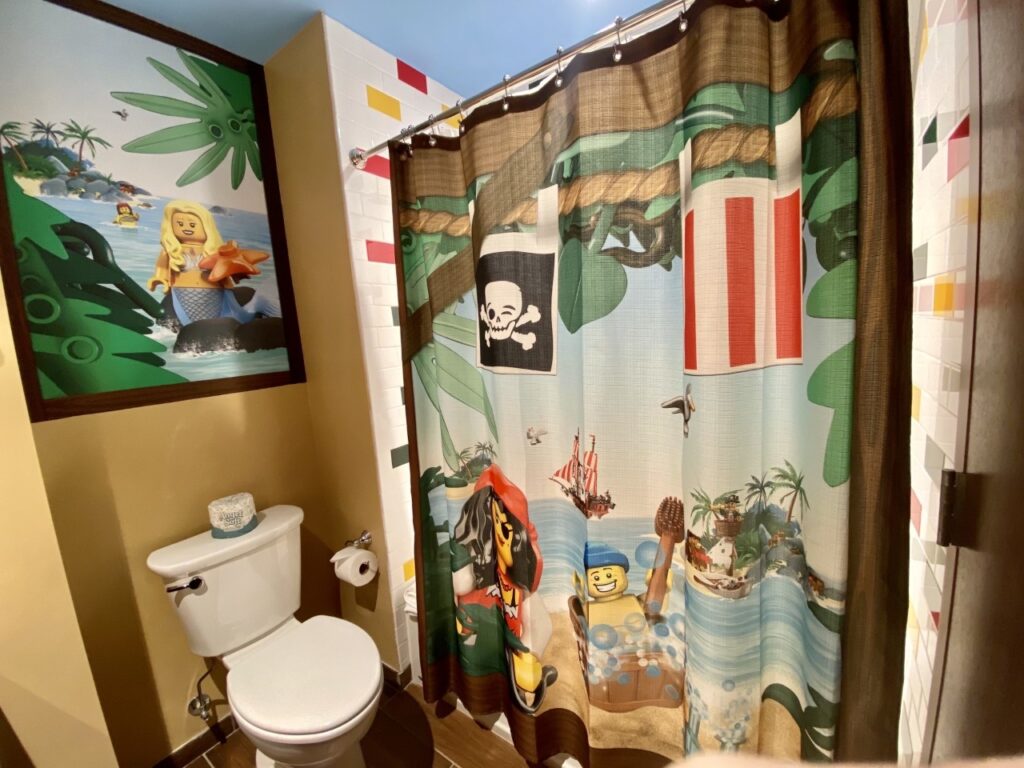 Shower/Bath Tub area inside the guest room bathroom at the Legoland Pirate Island Hotel