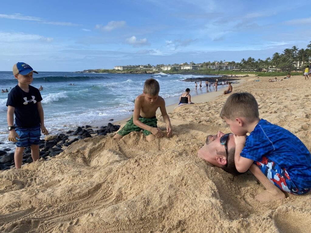 The sand was perfect for burying Dad at Shipwreck's Beach - Best of Kauai